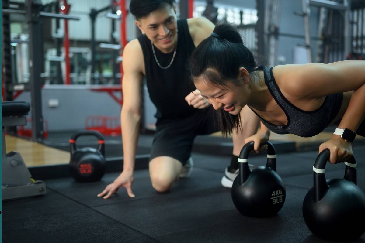 Personal Trainer Midtown NYC guiding a client through mobility and flexibility exercises at Fit4Blast.