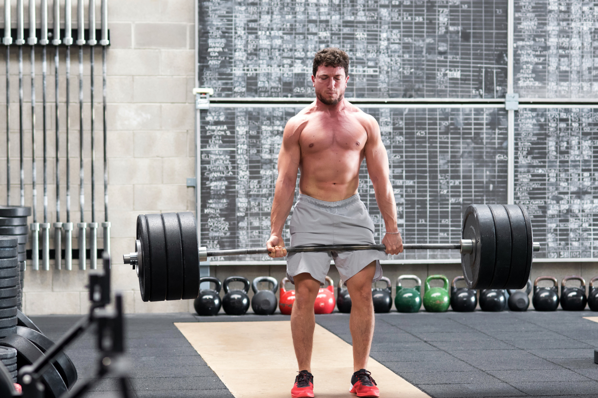 Client performing a heavy deadlift during a private personal training session in New Jersey.